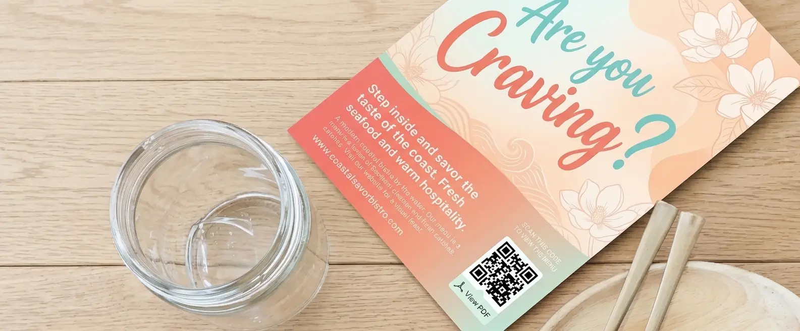 Event flyer with a QR code on a community noticeboard